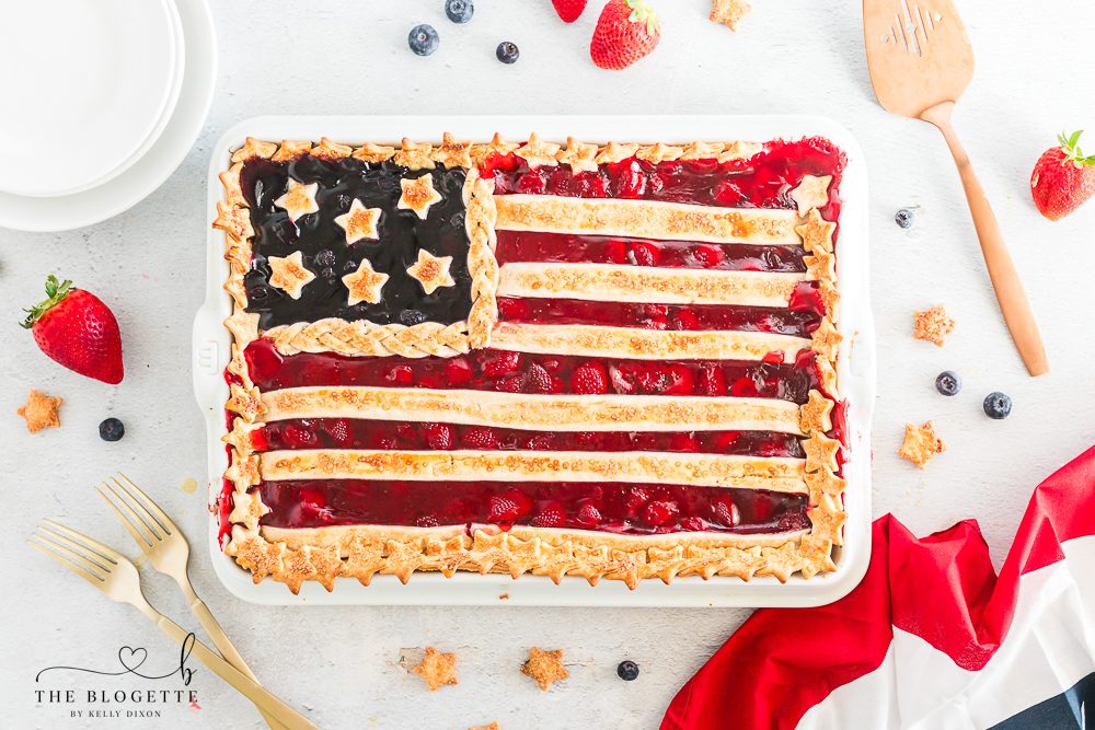 An straightforward-to-make American Flag Pie made with strawberry and blueberry pie filling with a golden sugared pie crust. A 4th of July Dessert!