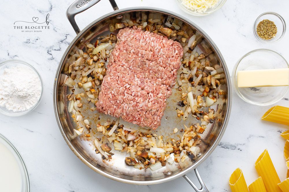 Ground sausage over mushrooms and onions