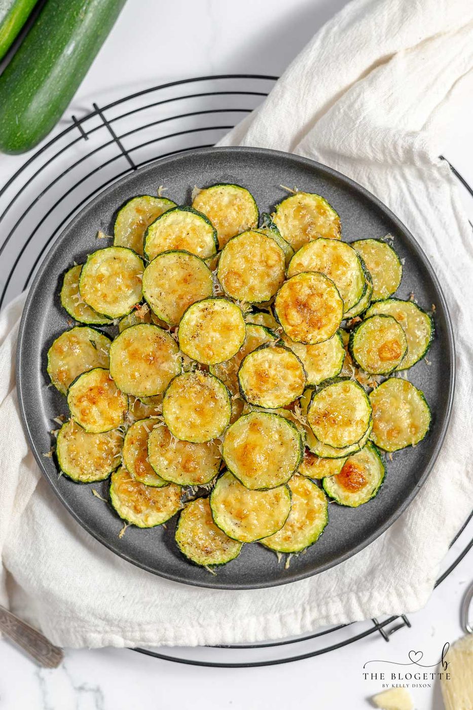 Cheesy and tender zucchini rounds baked to perfection. It’s a lighter, nutritious, and completely addictive side dish.
