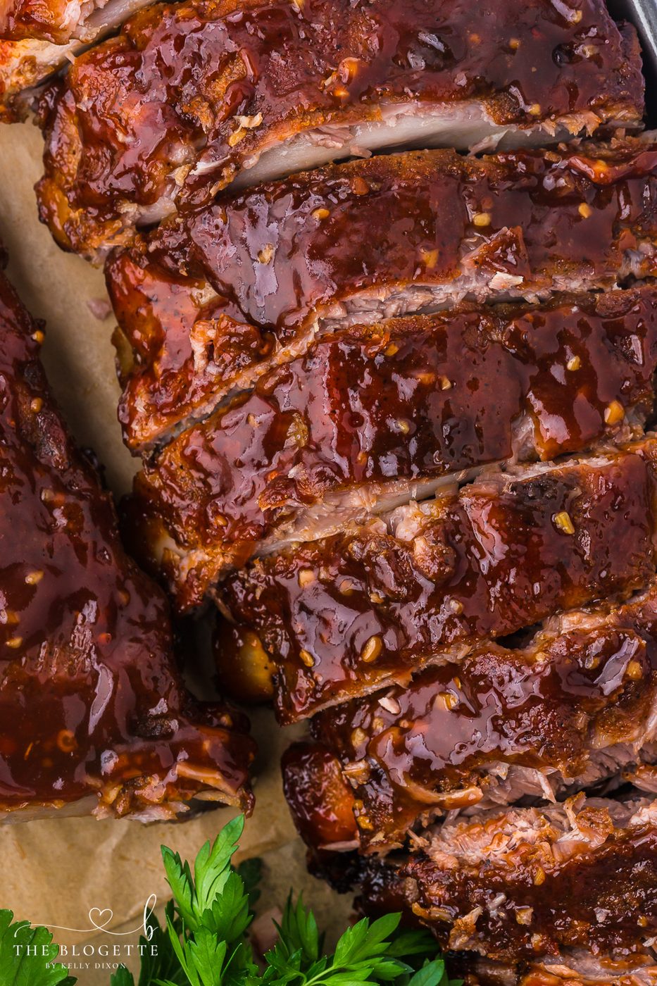 Baked Ribs - Tender ribs seasoned with a bold, flavorful sauce are baked in the oven until the meat is fall-off-the-bone. Comfort on a plate!