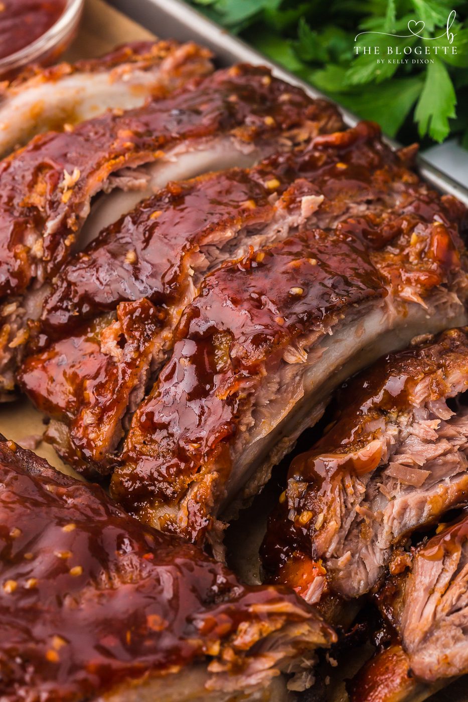 Baked Ribs - Tender ribs seasoned with a bold, flavorful sauce are baked in the oven until the meat is fall-off-the-bone. Comfort on a plate!