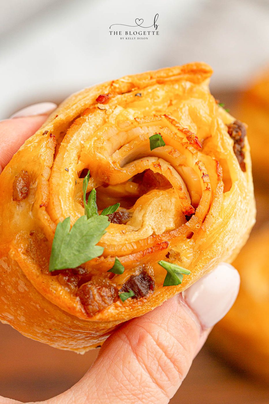 Baked Turkey and Cheese Rolls have melted cheese, bacon, and turkey covered in a garlic buttery glaze! The well-balanced party appetizer idea!