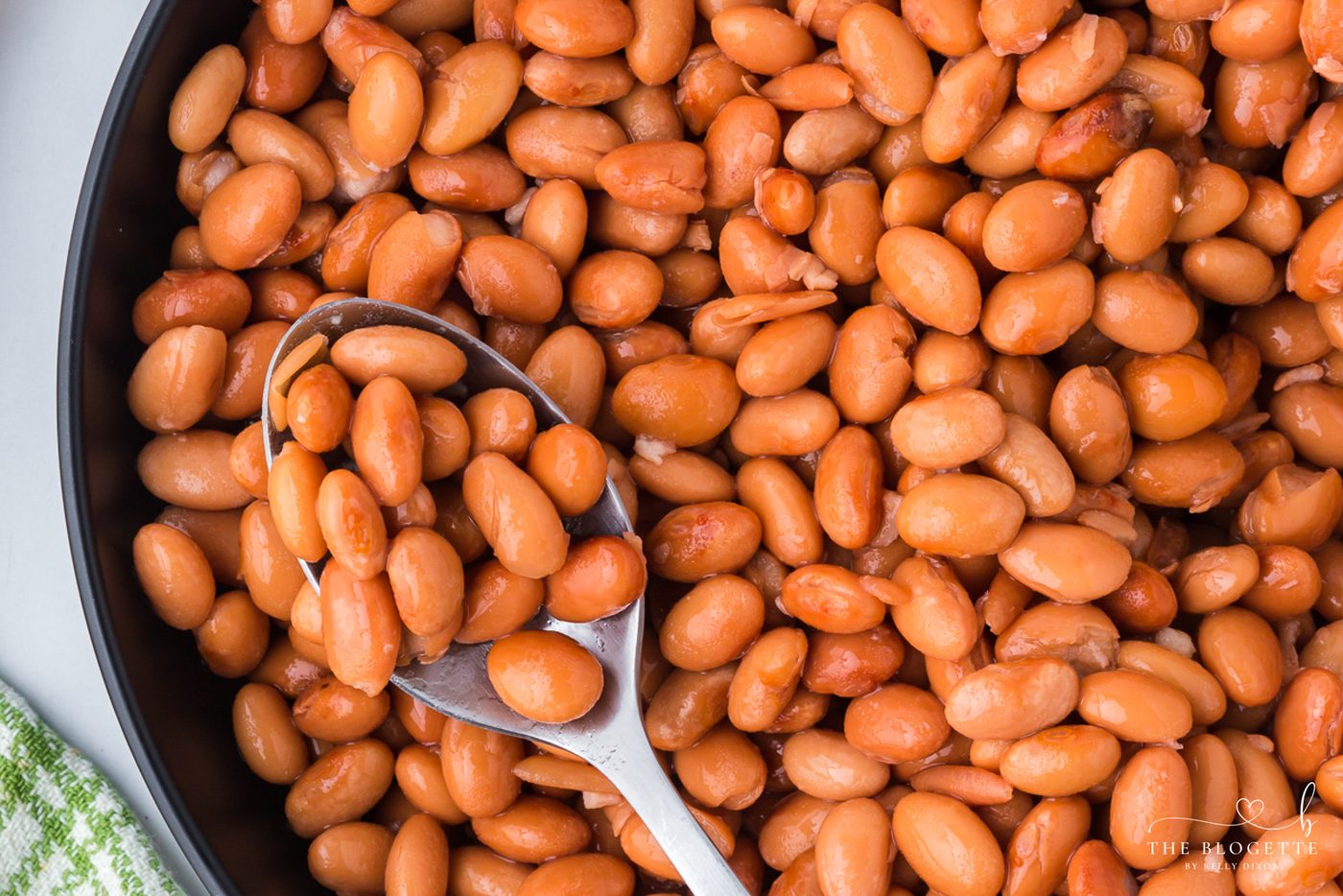 Learn how to make tender beans in the Slow-cooker with only two ingredients and no soaking! These straightforward slow cooker pinto beans are well-balanced for tacos, soups, burritos, casseroles, meal prep, and freeze-ahead friendly portions.