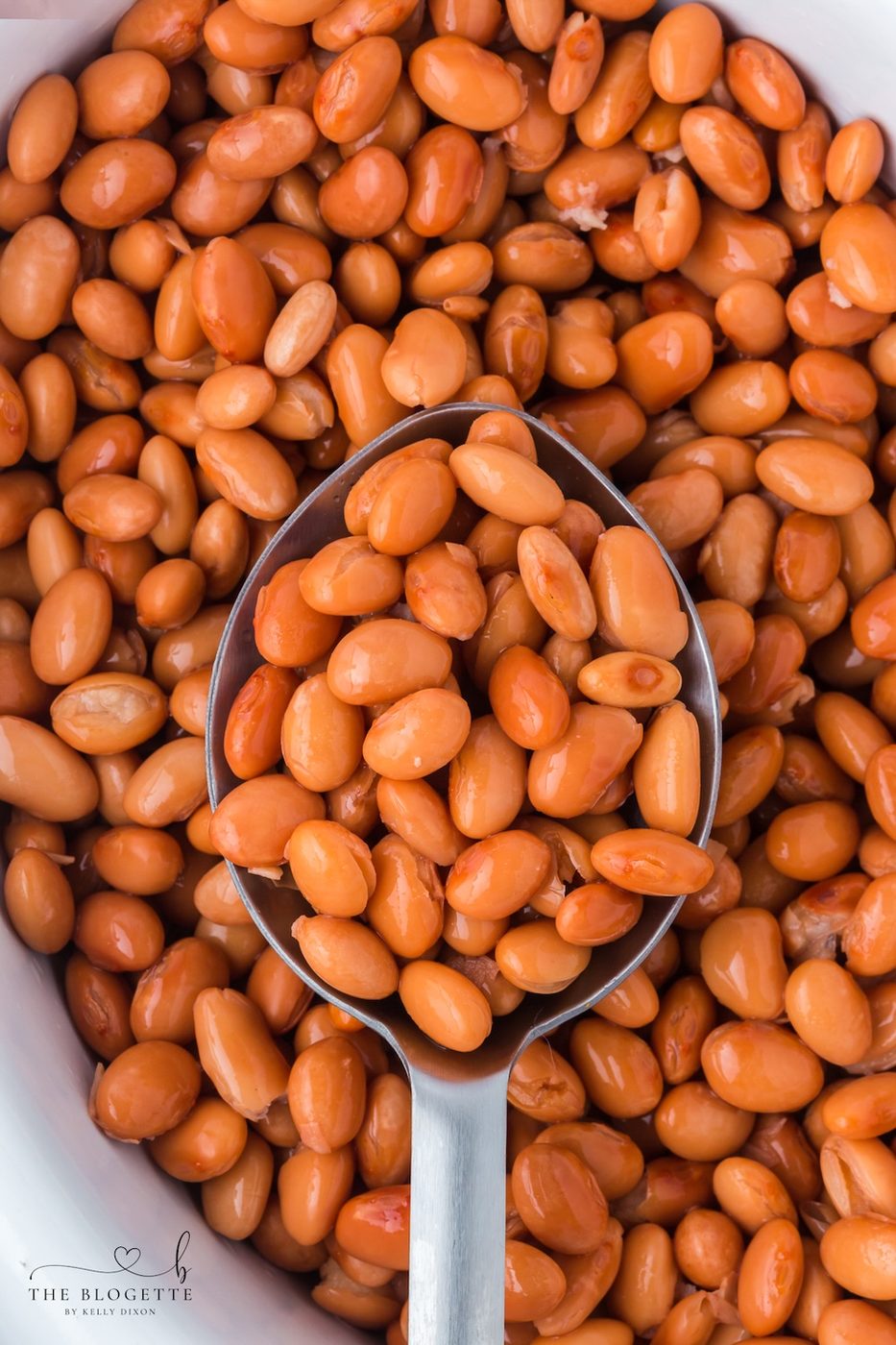 Learn how to make tender beans in the Slow-cooker with only two ingredients and no soaking! These straightforward slow cooker pinto beans are well-balanced for tacos, soups, burritos, casseroles, meal prep, and freeze-ahead friendly portions.