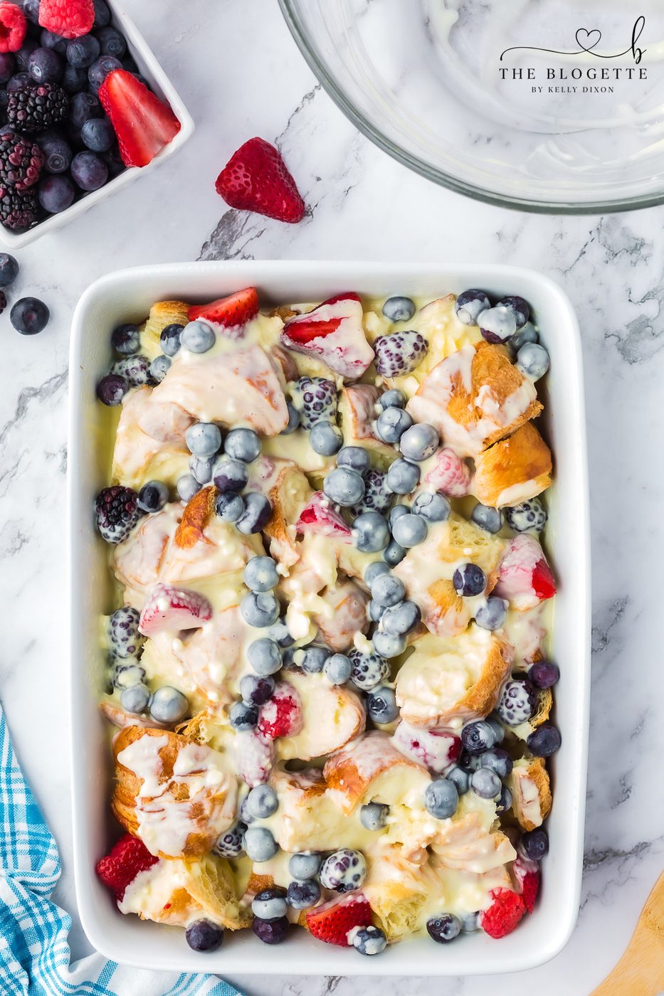 Creamy custard over berries and bread