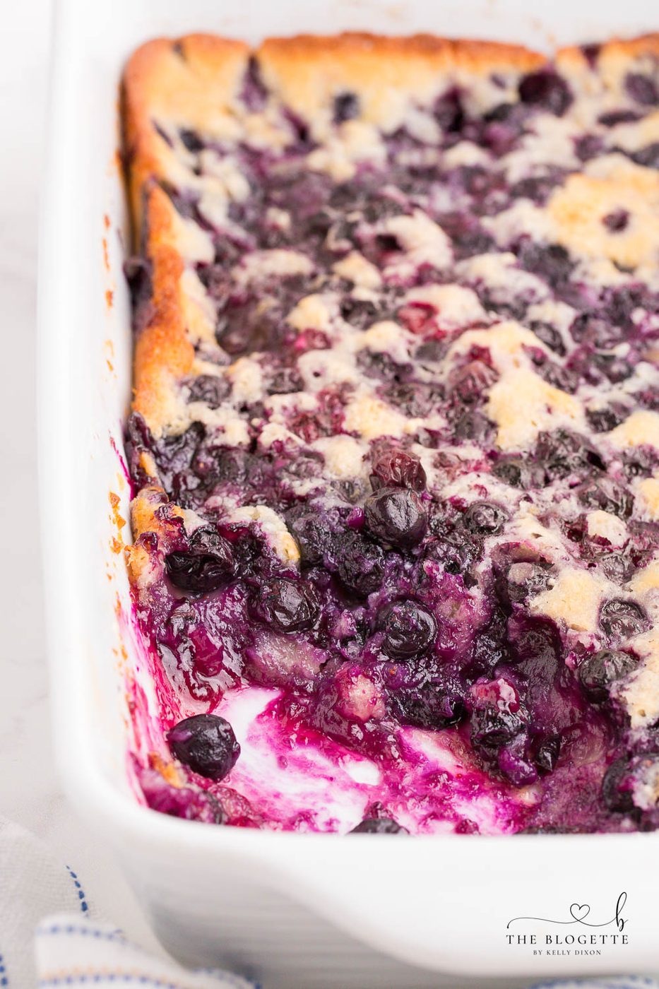 Blueberry Cobbler is a satisfying and straightforward recipe to use with all of those summer blueberries! It's a speedy and straightforward dessert topped with a scoop of vanilla ice cream.