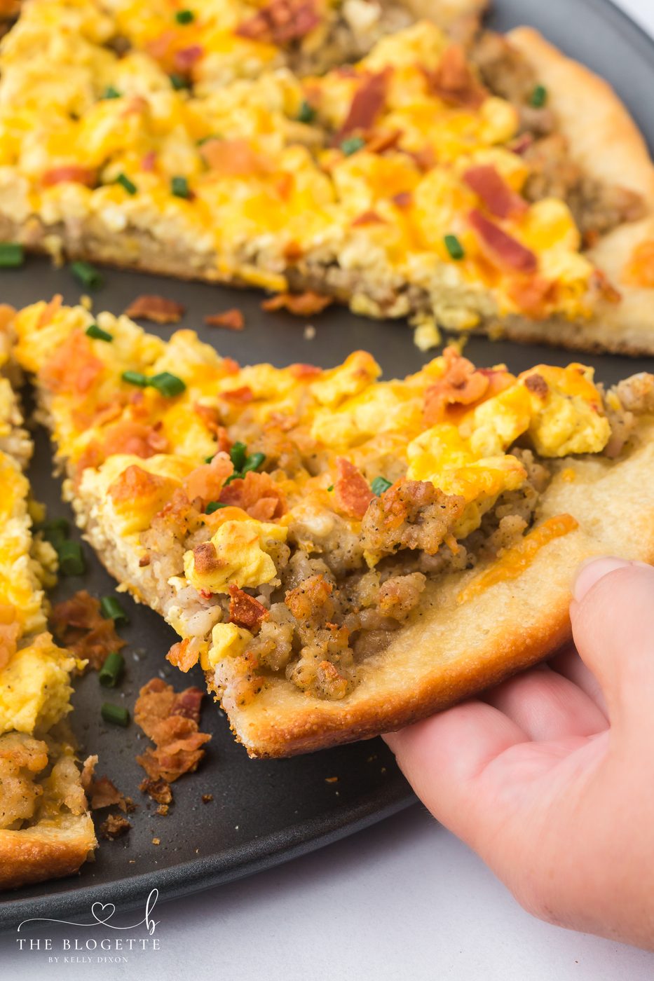 This cheesy breakfast pizza is loaded with scrambled eggs, sausage, and bacon on a golden crust. The well-balanced for brunch, weekends, or meal prep. Straightforward and satisfying!