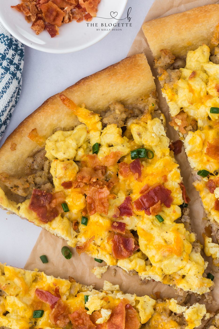 This cheesy breakfast pizza is loaded with scrambled eggs, sausage, and bacon on a golden crust. The well-balanced for brunch, weekends, or meal prep. Straightforward and satisfying!
