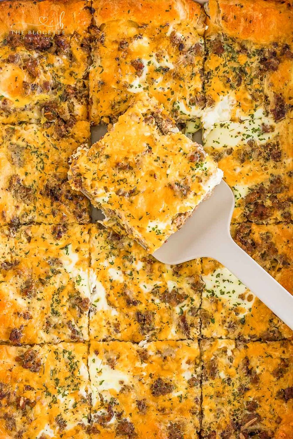 Our favorite Breakfast Sausage Casserole with a layer of cheese, eggs, crescent dough, and sausage!