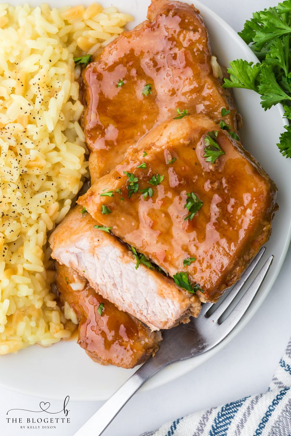 These Brown Sugar Pork Chops are coated in a rich, buttery, sweet-and-savory glaze that bakes into juicy perfection. Straightforward weeknight recipe with oven and slow-cooker options! Save this family-favorite pork chop idea for dinner tonight.