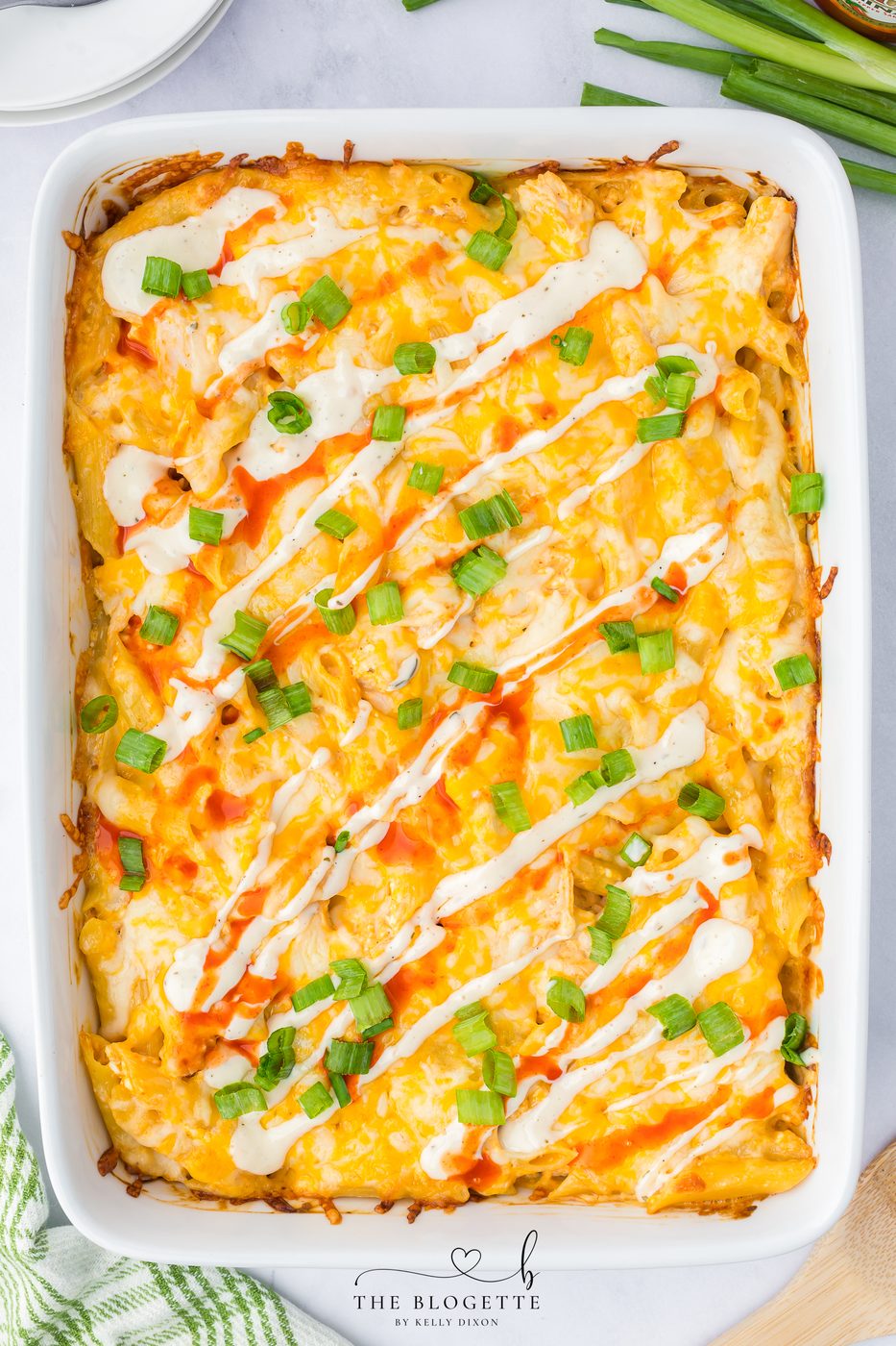 Buffalo Chicken Pasta Bake - Creamy, spicy, and loaded with melty cheese. The well-balanced weeknight meal that comes together in under an hour.