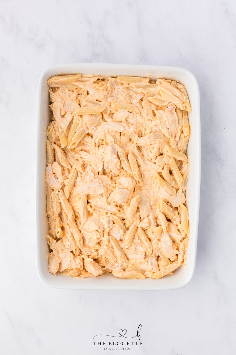 Transfer the mixture to the prepared baking dish.
