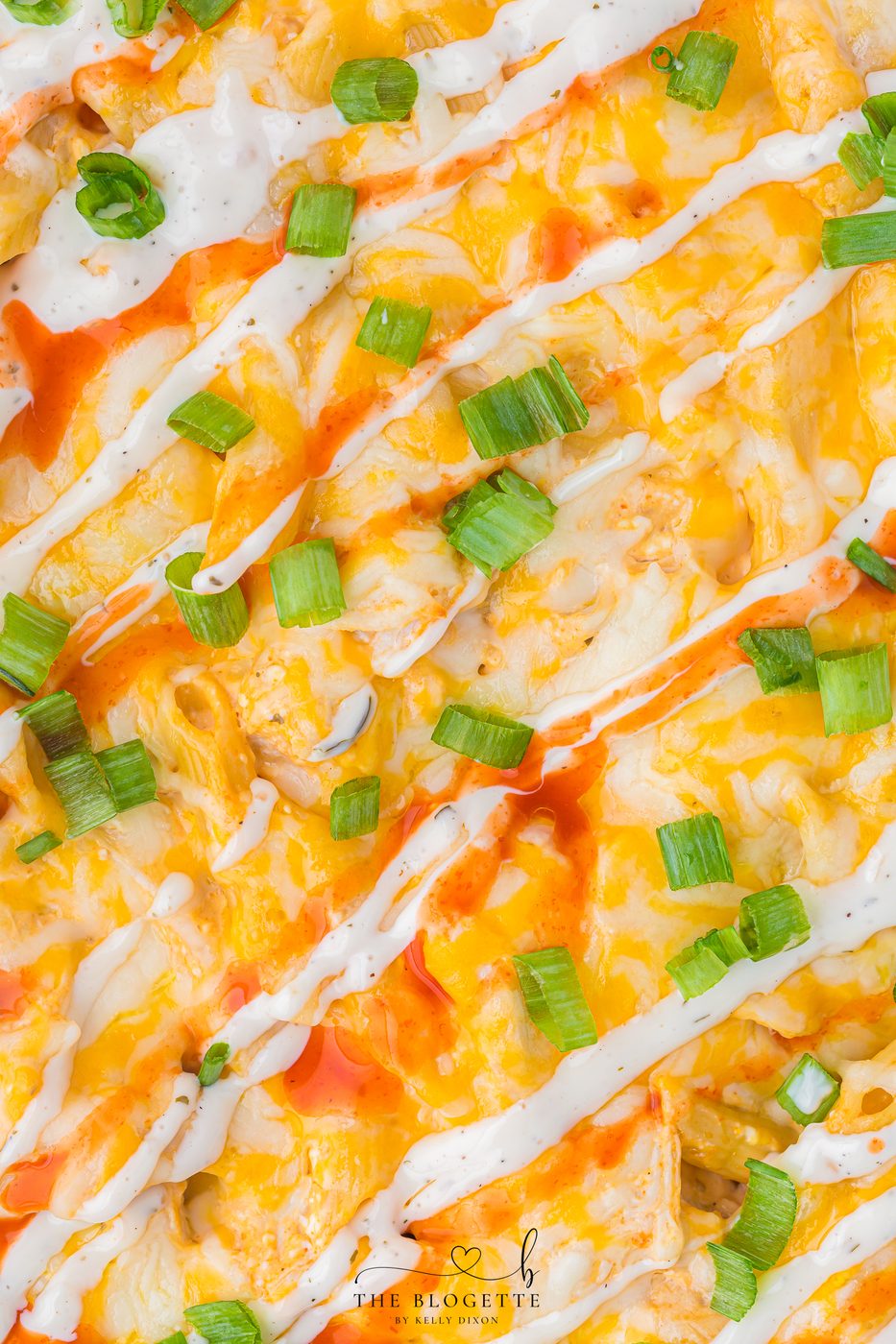 Buffalo Chicken Pasta Bake - Creamy, spicy, and loaded with melty cheese. The well-balanced weeknight meal that comes together in under an hour.