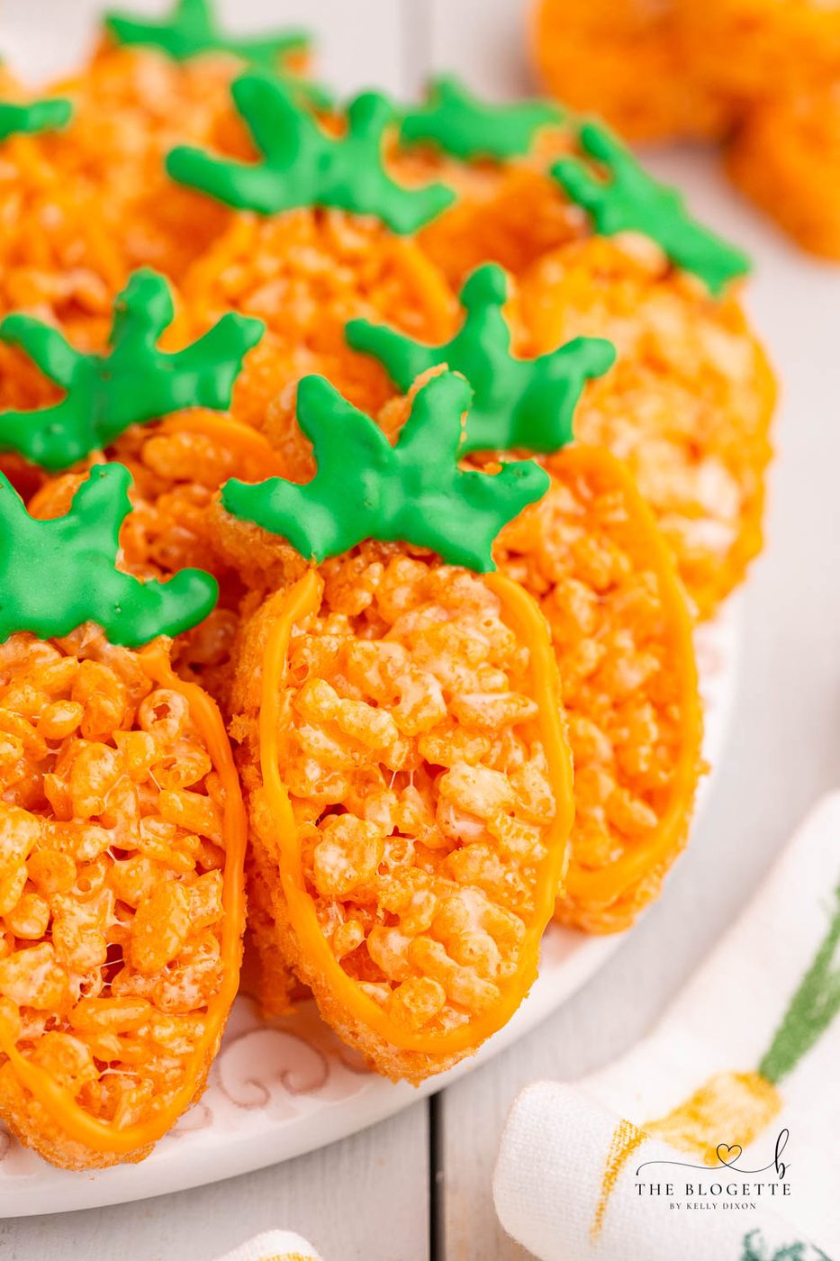 Carrot Rice Krispie Treats are a well-balanced Easter dessert! Everyone's favorite Rice Krispies Treats turned into little carrots.