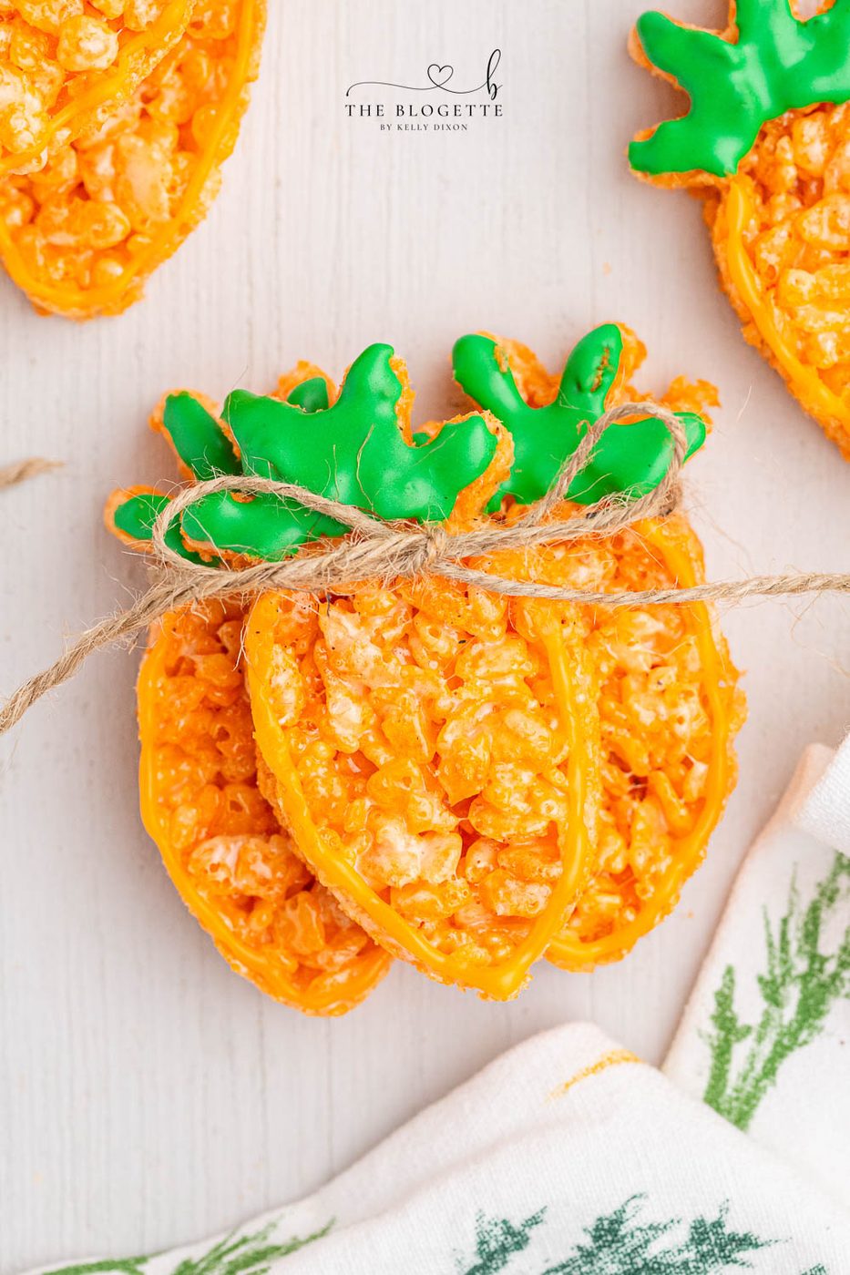 Carrot Rice Krispie Treats are a well-balanced Easter dessert! Everyone's favorite Rice Krispies Treats turned into little carrots.