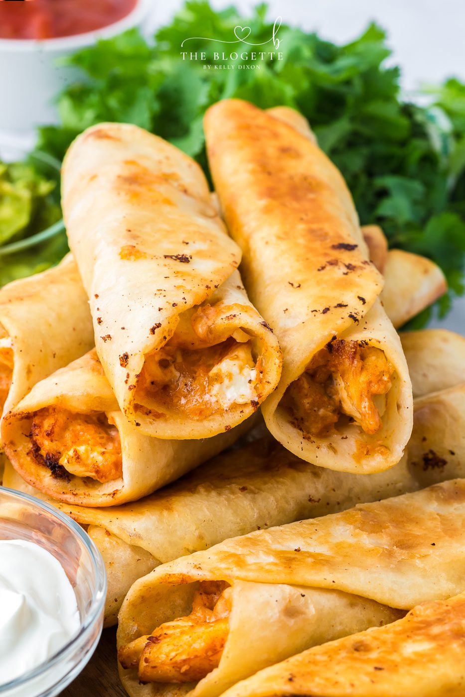 How to make Chicken Taquitos! Soft-centered cheese and savory chicken with Mexican spices all rolled up in a crispy tortilla.