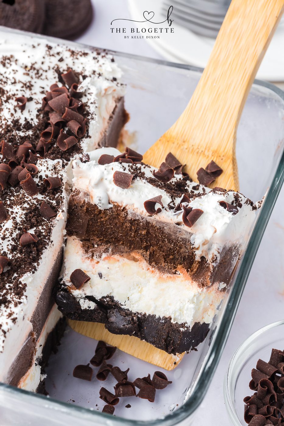 Chocolate Lasagna has layers of rich chocolate pudding, creamy cream cheese filling, and whipped topping with an Oreo crust.