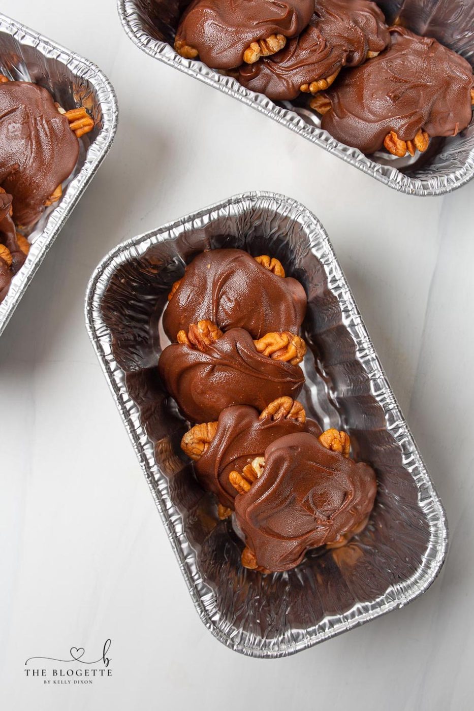 Making Chocolate Turtles couldn't be easier or more fun! They make fabulous gifting and holiday candy. From-scratch pecan turtle candies come together quickly using the microwave to melt the caramel and chocolate.