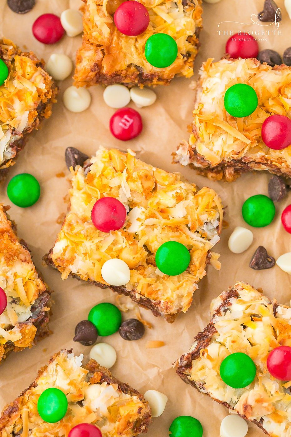 Straightforward Christmas Magic Bars made with graham crackers, sweetened condensed milk, chocolate chips, coconut, and festive M&M’s. A speedy holiday dessert everyone loves!