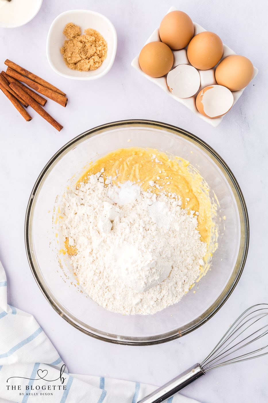 Add the all- purpose flour, cinnamon, baking powder, baking soda, and salt.