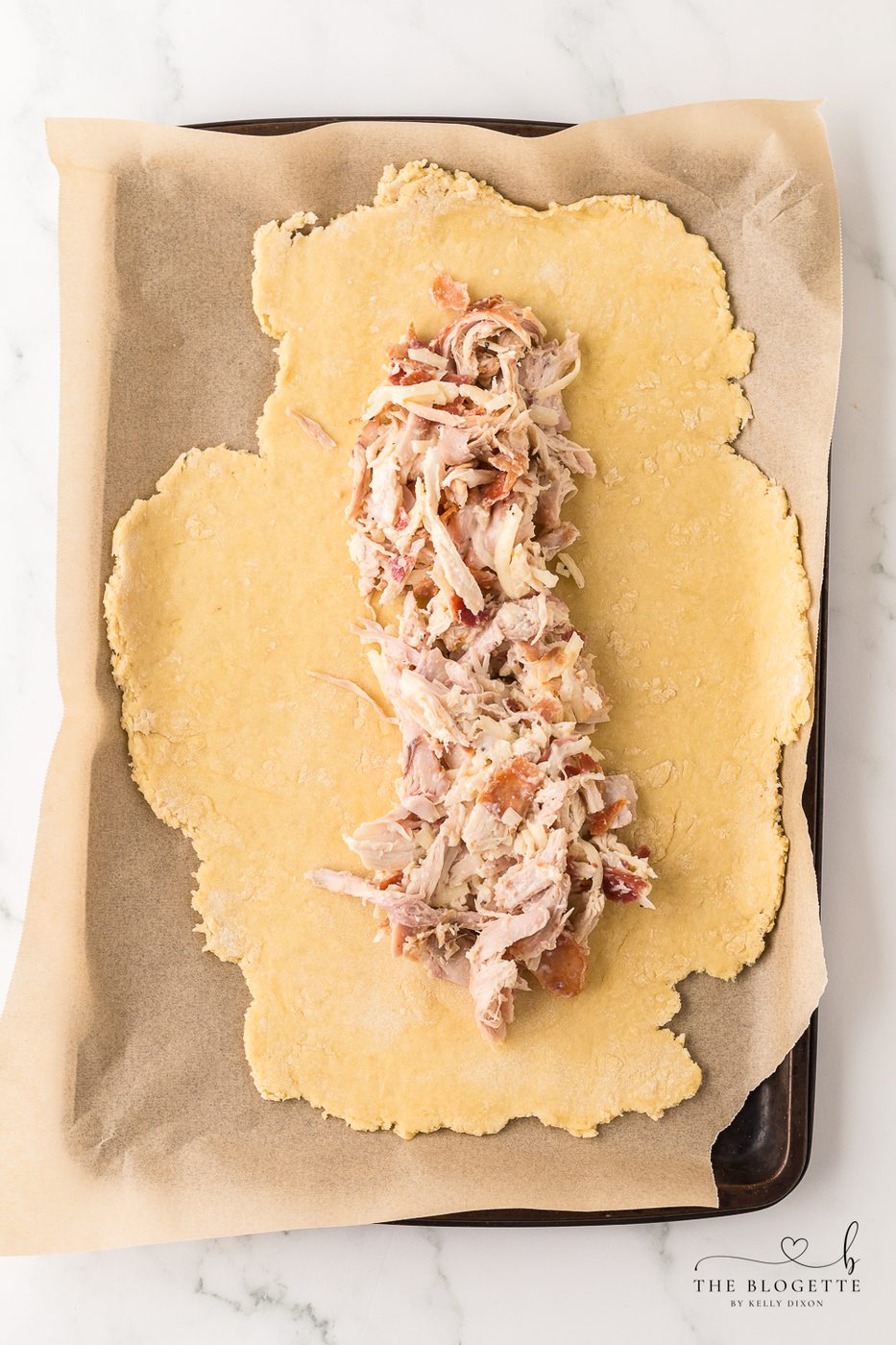 Chicken mixture over the dough
