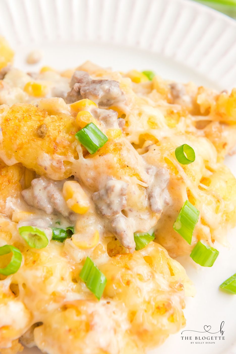 Cowboy Casserole is an straightforward and comfort-food dinner with simple ingredients like ground beef, corn, cheese, and sour cream, then topped with satisfying tater tots.