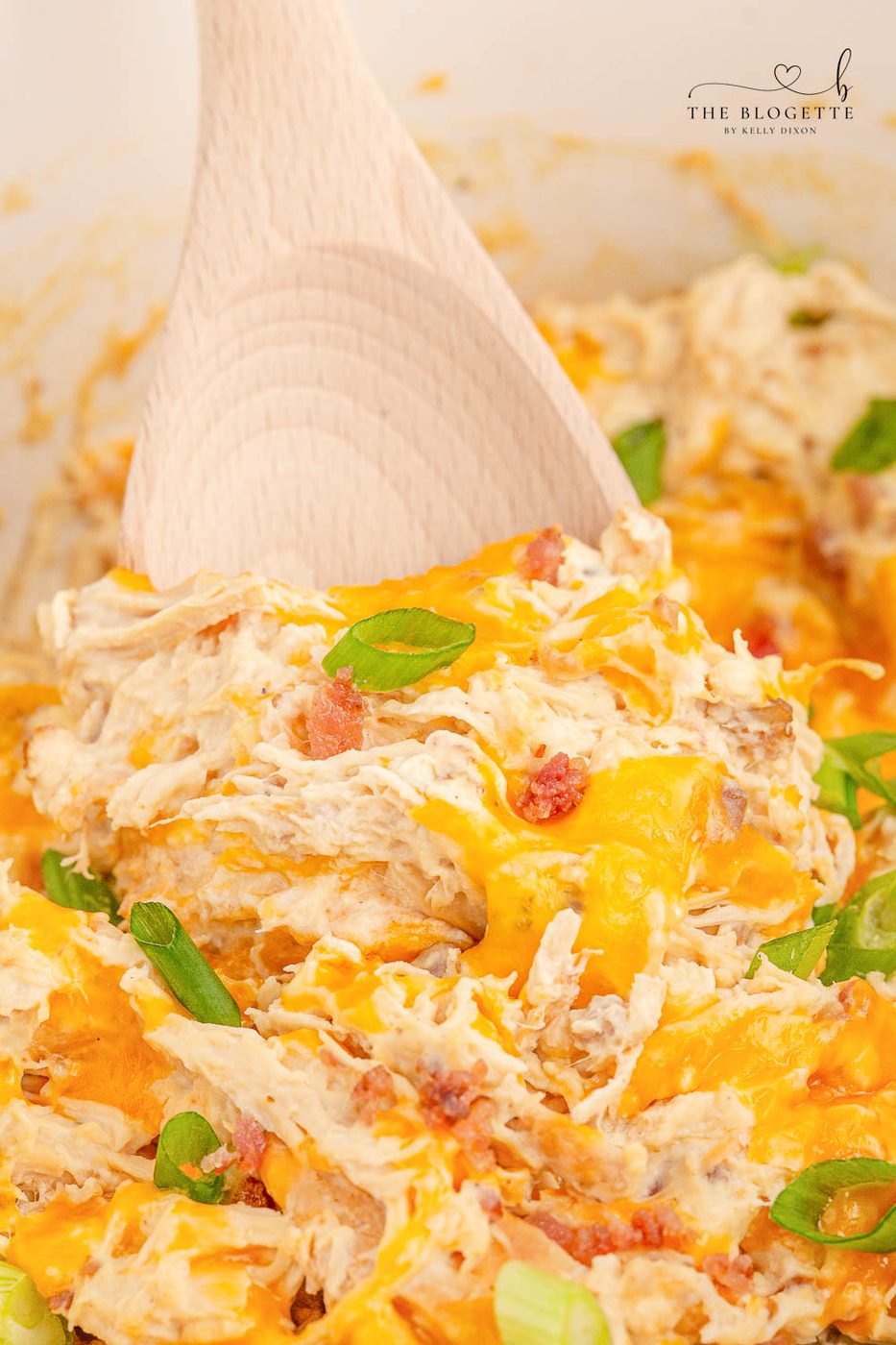 Slow-cooker Crack Chicken is a heavenly dish featuring everyone's favorite chicken breasts, cream cheese, ranch seasoning, and bacon!