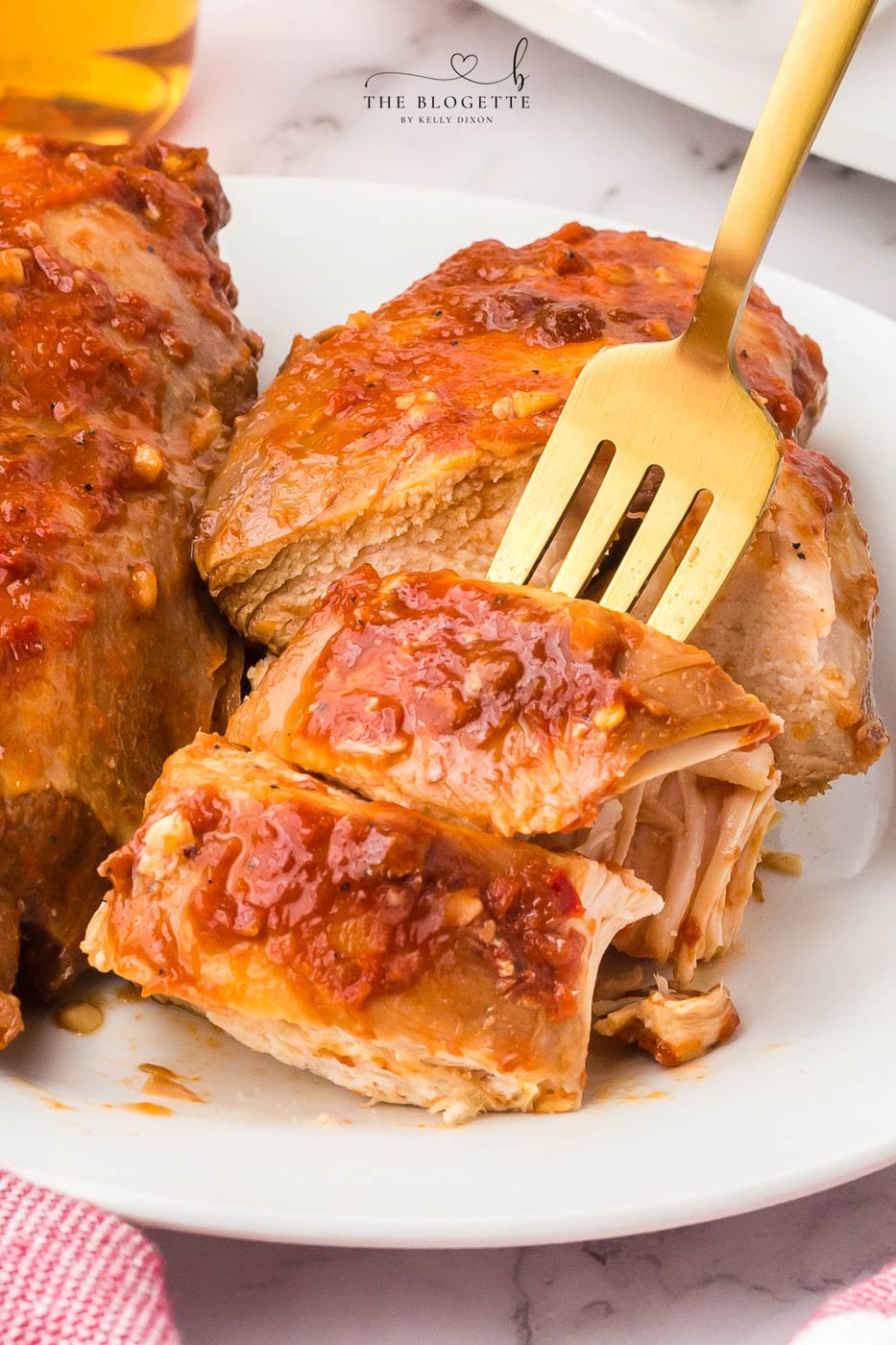 Slow-cooker Fireball Chicken - a flavorful slow cooker chicken seasoned with a from-scratch Fireball-flavored sauce! The whiskey sauce makes the chicken so juicy and satisfying.