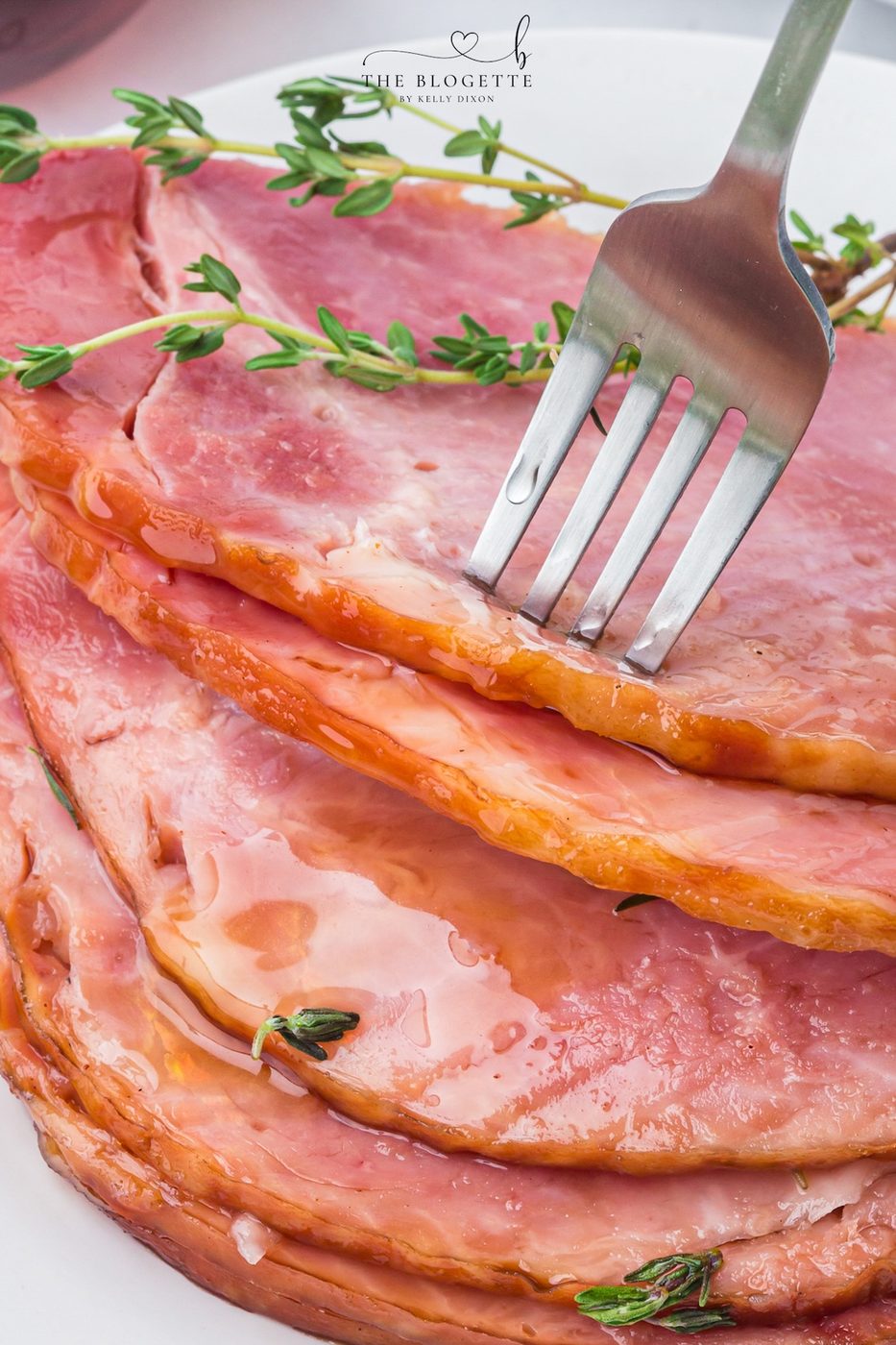 Make tender Slow-cooker Ham with a maple brown sugar glaze, pineapple juice, butter, and thyme. An straightforward holiday ham recipe made in the slow cooker!