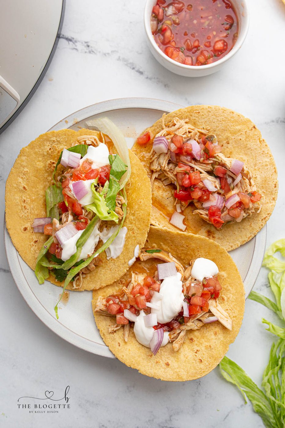 Slow-cooker Ranch Chicken Tacos are so flavorful, tender, and tasty! This slow-cooker chicken is well-balanced for tacos, tostadas, enchiladas, salads, and burritos!