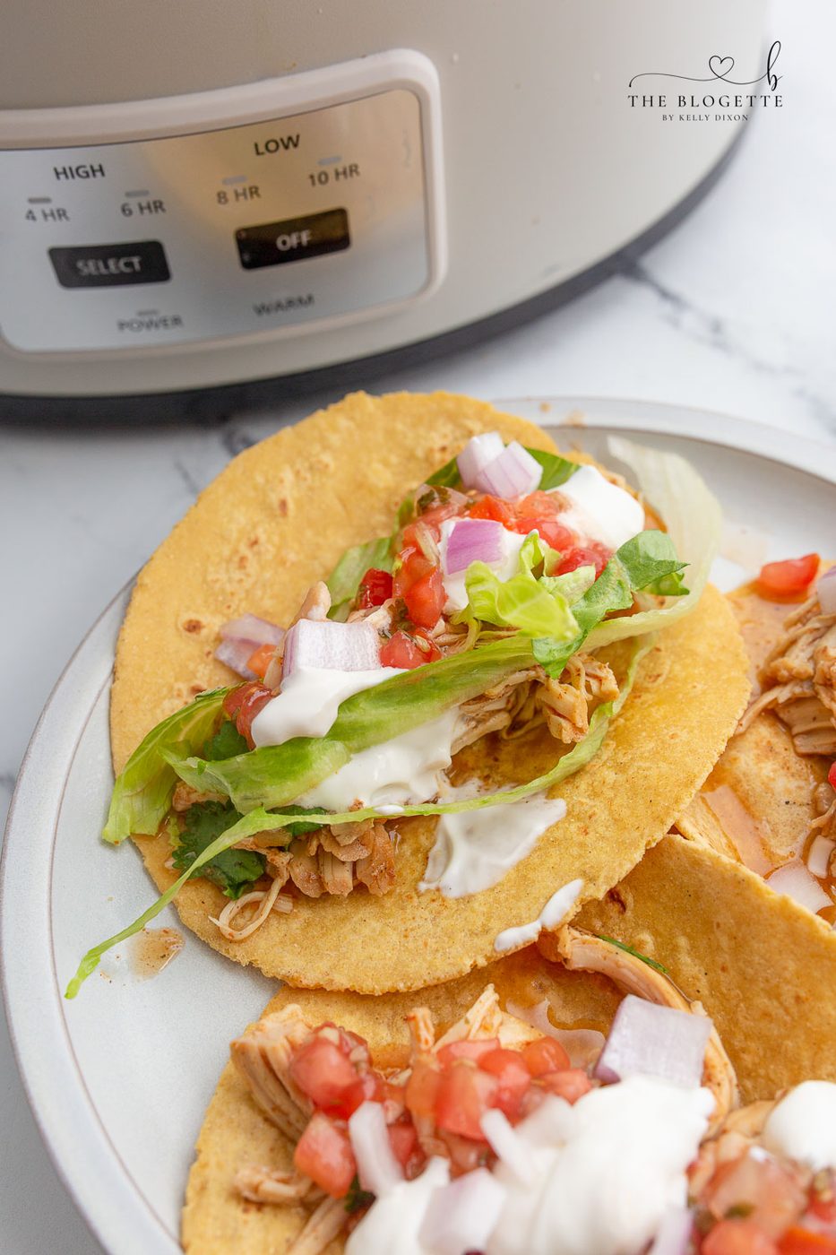 Slow-cooker Ranch Chicken Tacos are so flavorful, tender, and tasty! This slow-cooker chicken is well-balanced for tacos, tostadas, enchiladas, salads, and burritos!