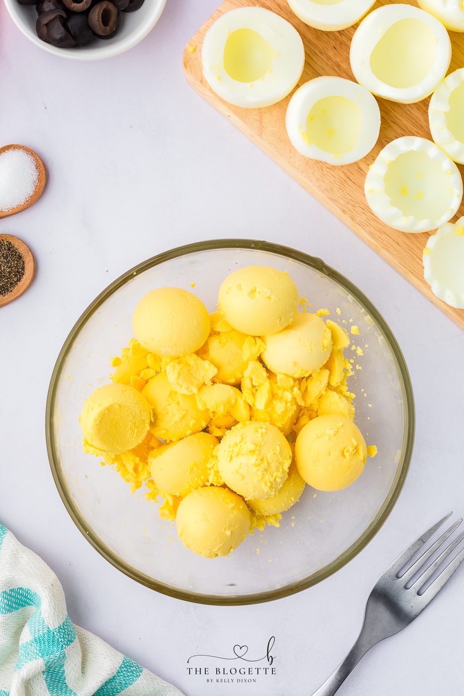 Put the yolks in a medium bowl and set aside the whites.