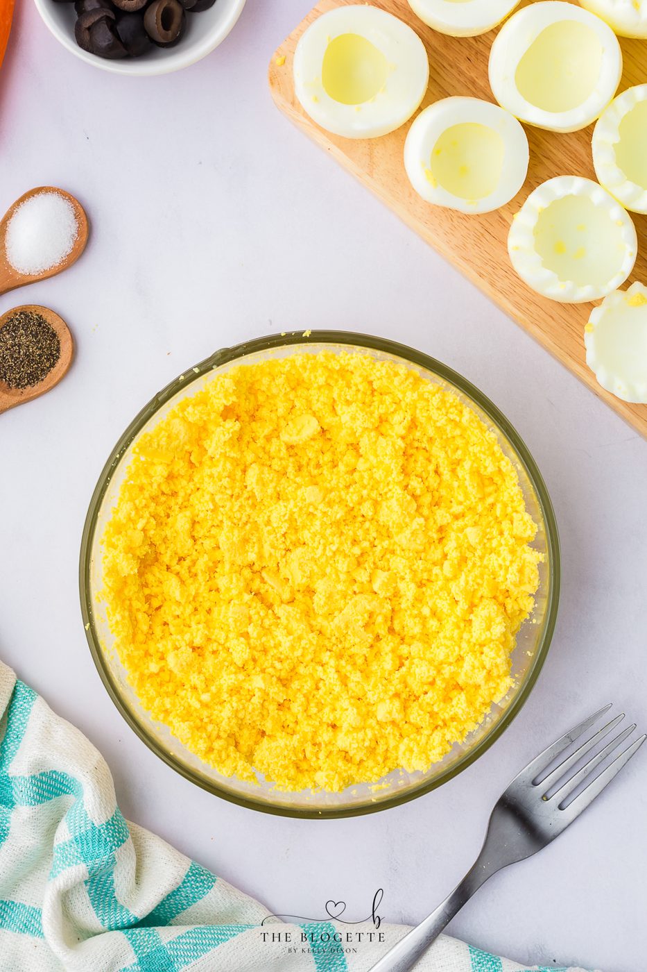 Mash the yolks with a fork until you have a fine crumble of yolk.