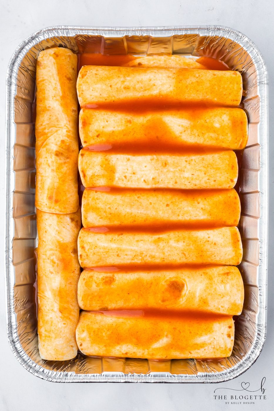 Cover with enchilada sauce