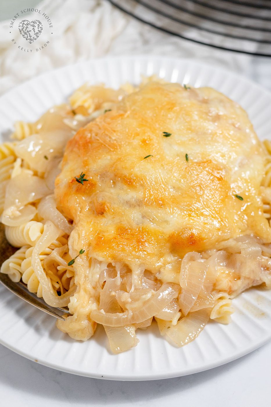 French Onion Chicken features juicy chicken breast, melted butter, caramelized onions, and lots of soft-centered melted cheese all cooked in one fabulous skillet.