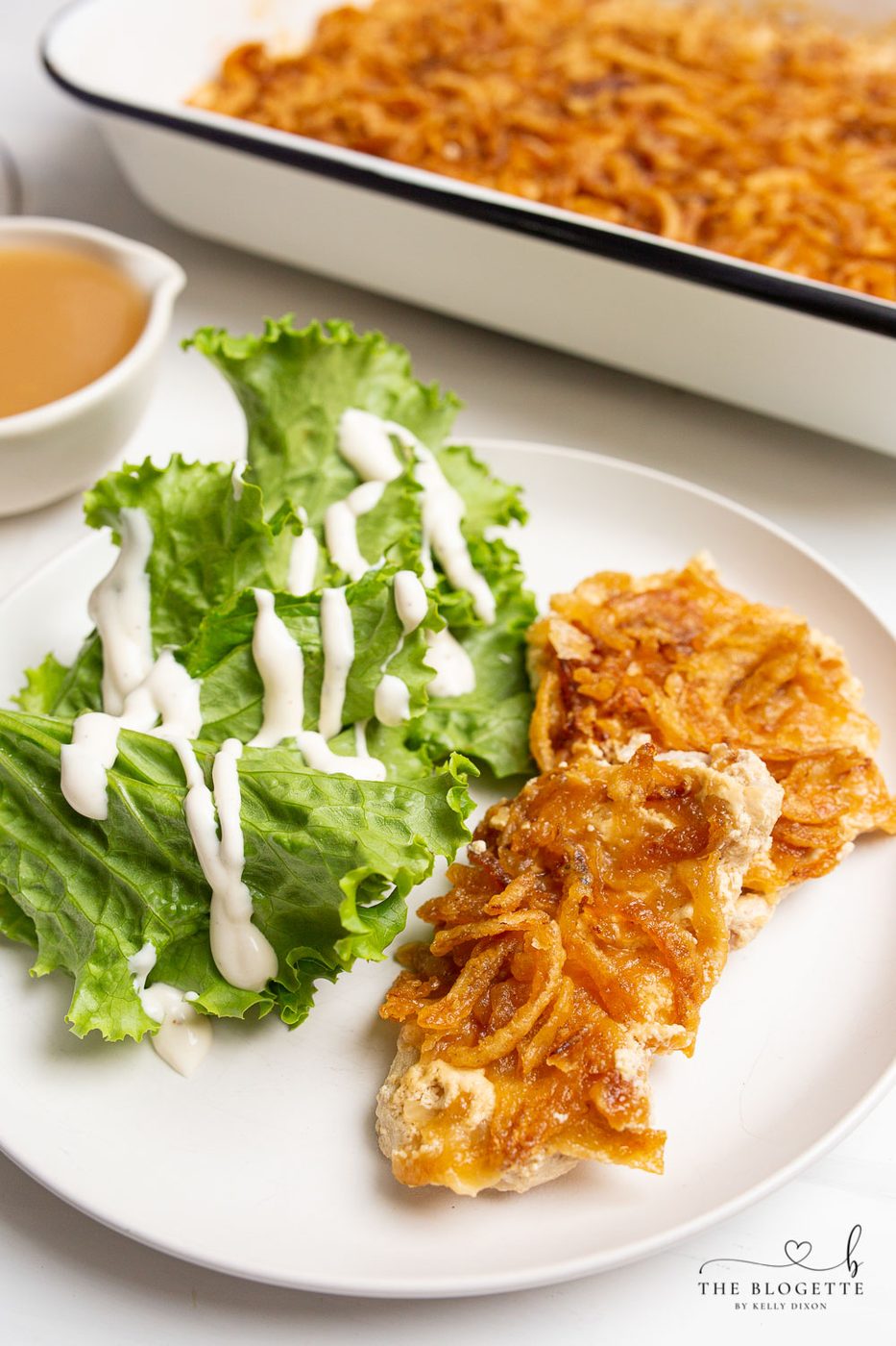 Pork Chop Casserole is easily made with pork chops smothered in an addicting creamy sauce and topped with everyone's favorite crispy fried onions! Whether a holiday dish or a comforting weeknight meal, you and your family will love this. Add it to your menu now!