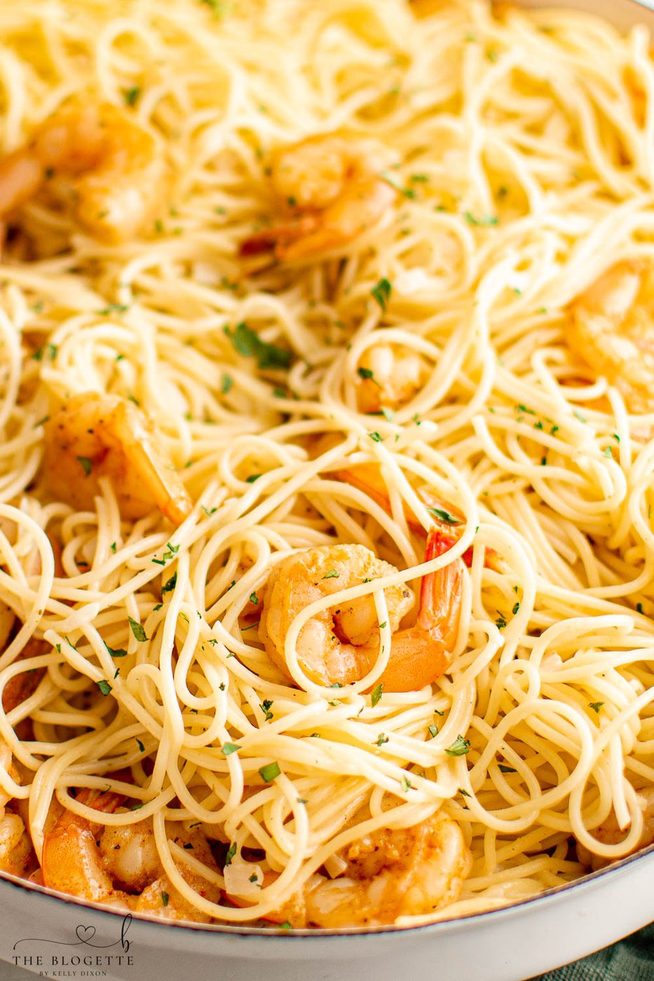 Garlic Butter Shrimp Scampi Pasta is large, juicy shrimp in garlic butter tossed in a creamy pasta. This shrimp scampi recipe is straightforward to mix!