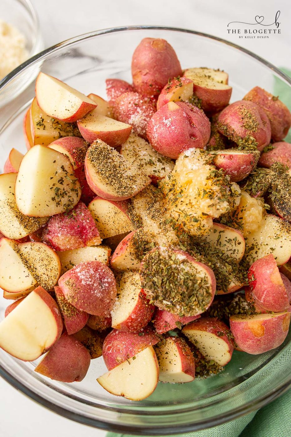 Tossing Garlic Parmesan Roasted Potatoes