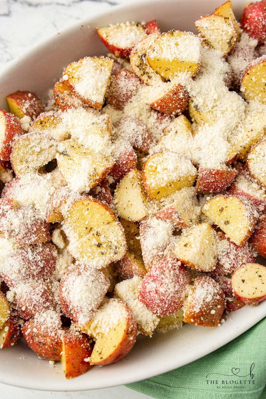 Tossing Garlic Parmesan Roasted Potatoes