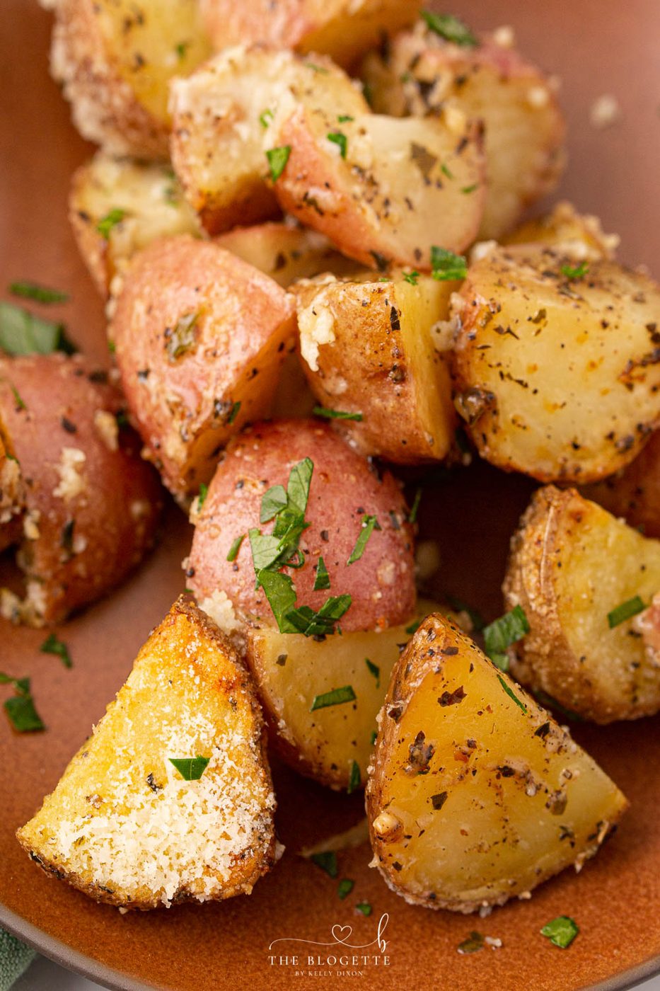 Crisp and tender Garlic Parmesan Roasted Potatoes are the well-balanced side for so many of your meals!