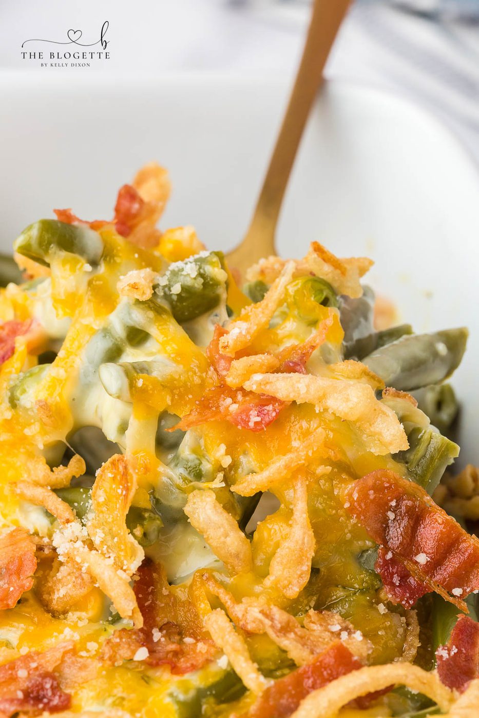 A creamy and Cheesy Green Bean Casserole with Bacon will be a hit on your holiday table. A must-have recipe for Thanksgiving and Christmas!