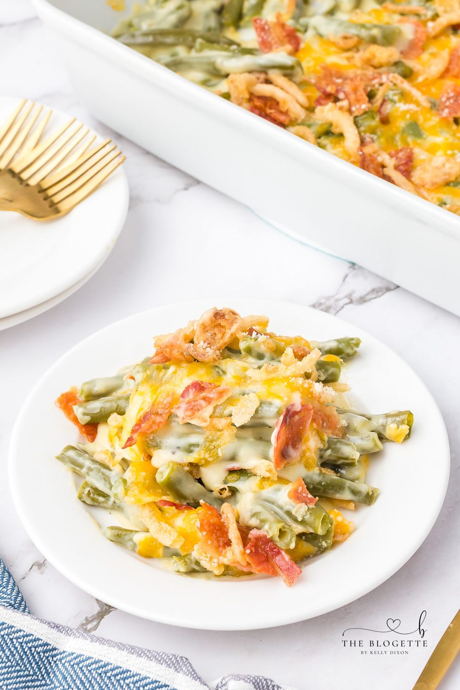 A creamy and Cheesy Green Bean Casserole with Bacon will be a hit on your holiday table. A must-have recipe for Thanksgiving and Christmas!