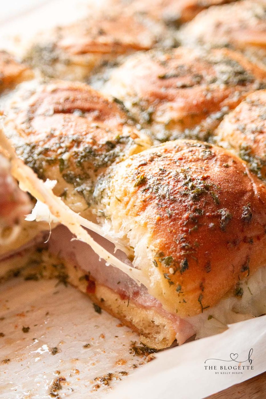 Ham and Cranberry Sliders are great to use with Thanksgiving leftovers or whip up as an appetizer for Bowl!