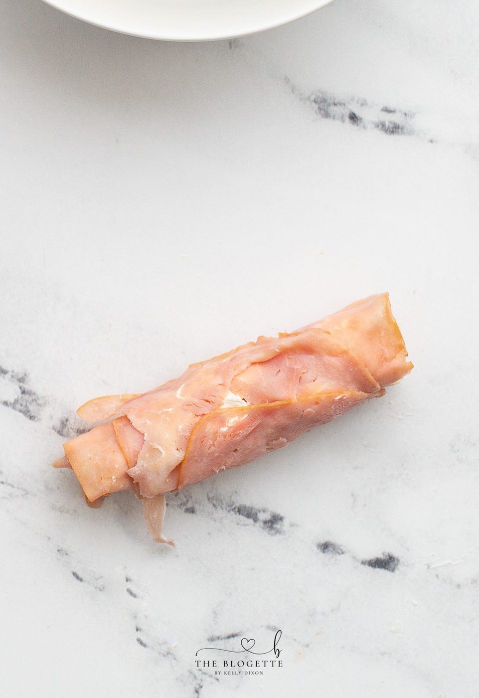Pickle wrapped in ham