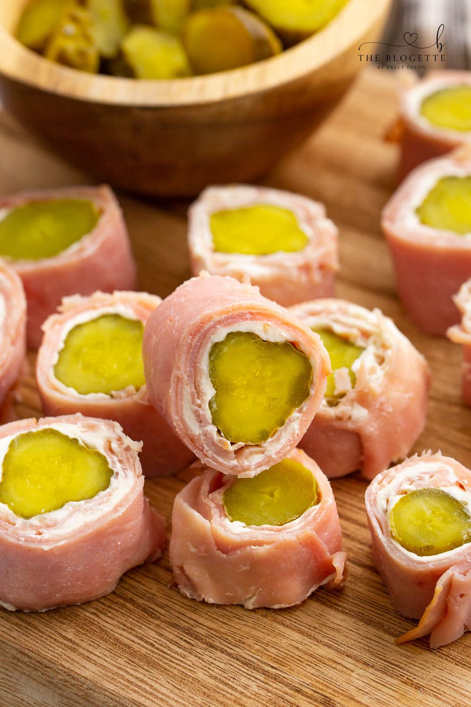 Ham and Pickle Roll Ups are one of our favorite appetizers ever! Ham, cream cheese, and pickles rolled up into a tasty straightforward appetizer.