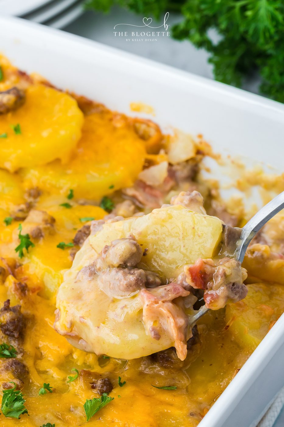 Hamburger and Potato Casserole is a comforting and hearty dinner made in one dish! Potatoes and bacon in a creamy and cheesy sauce.