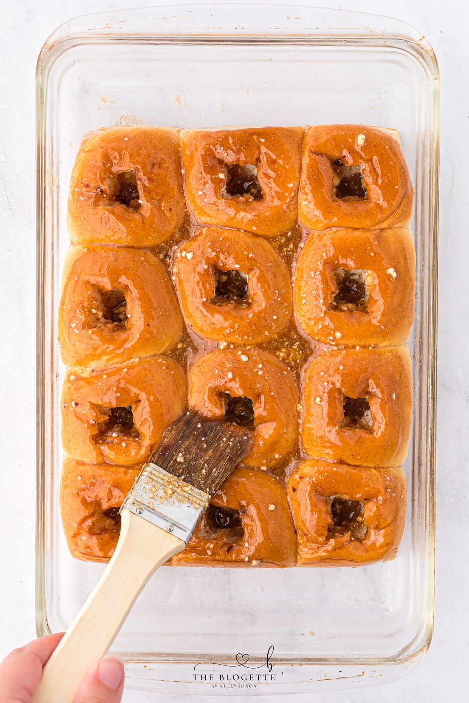 brush the mixture over the tops and insides of each roll