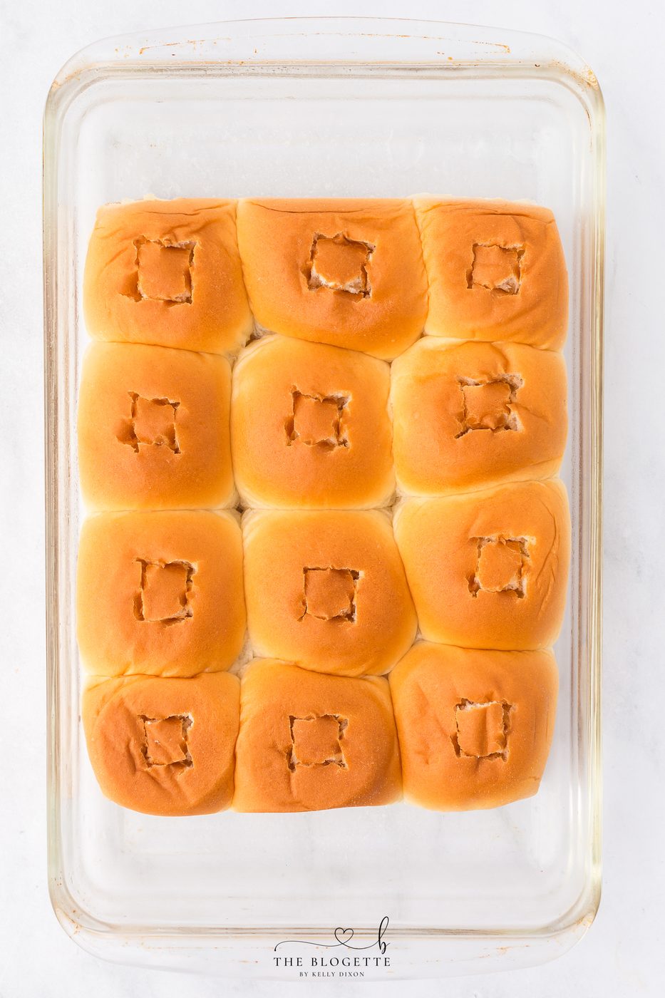 Cut a small square in the top of each roll