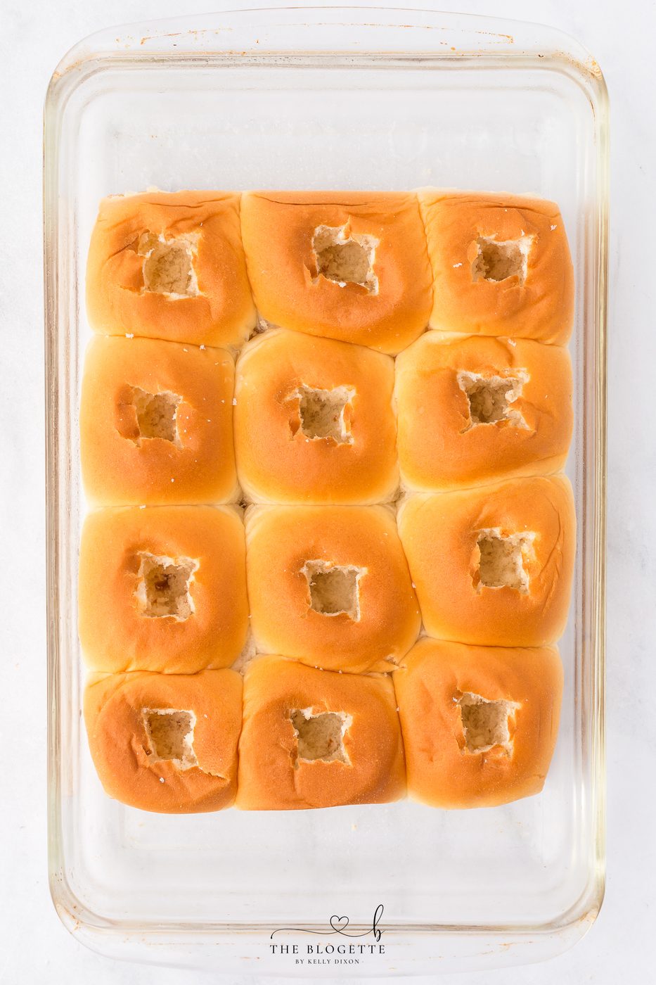 Cut a small square in the top of each roll