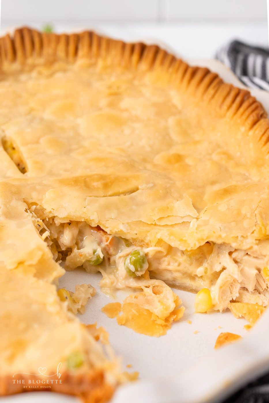 One of the most popular comfort food meals of all time, this From-scratch Chicken Pot Pie has a flaky, buttery crust, a creamy sauce, and a deliciously filling mix of chicken and vegetables.